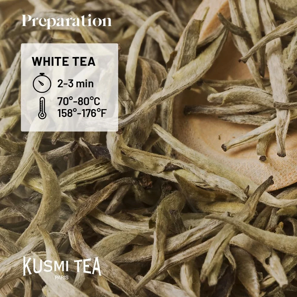 Kusmi Tea White Bellini organiczna biała herbata o smaku brzoskwini i moreli metalowa puszka 90 g