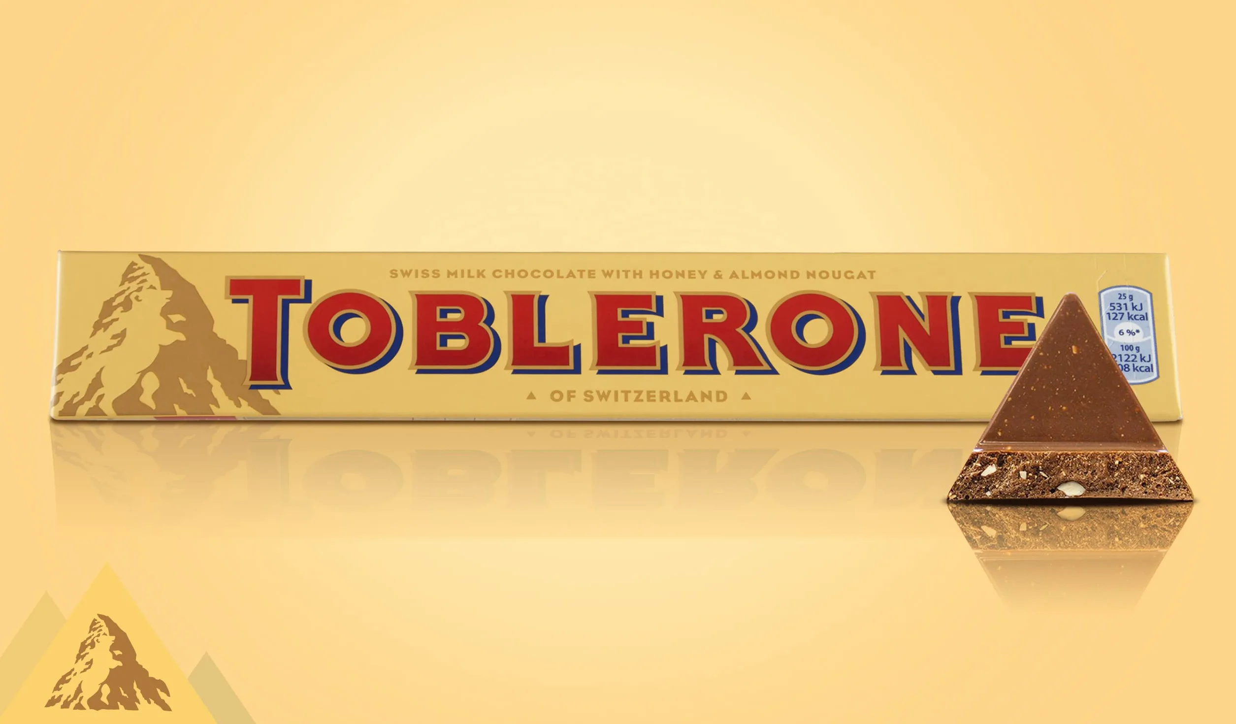 Toblerone Szwajcarska czekolada mleczna z nugatem miodowo-migdałowym 100 g