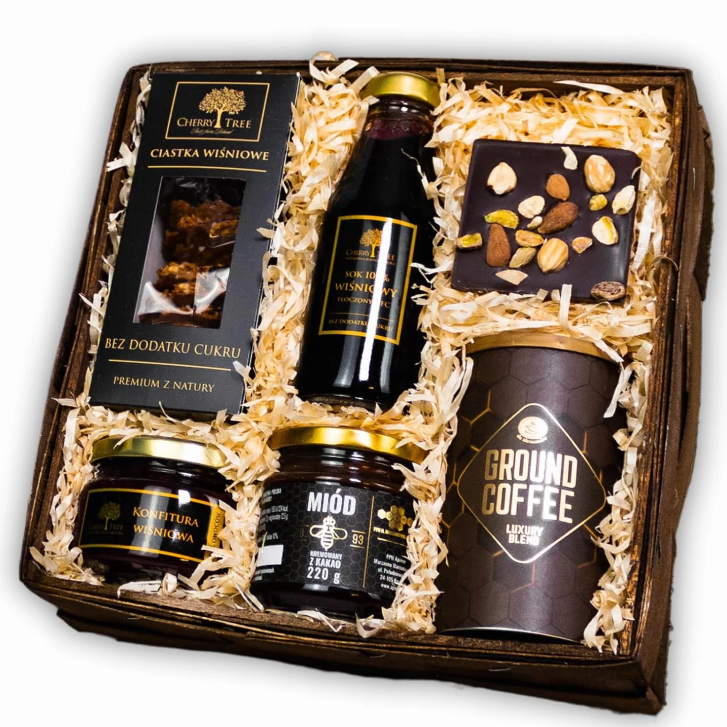 Kosz prezentowy, zestaw upominkowy Marcello - z produktami wiśniowymi z Manufaktury Cherry Tree, aromatyczną kawą mieloną w tubie, miodem z dodatkiem kakao oraz czekoladką z dodatkami.
